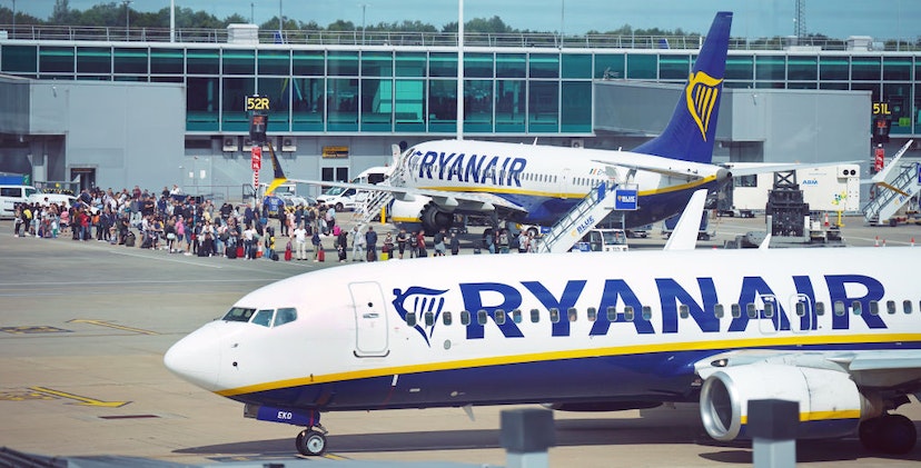 RETRANSMITTING AMENDING DATE Previously unissued photo dated 04/07/22 of passengers queuing to board Ryanair planes at Stansted Airport, Essex. Issue date: Tuesday July 26, 2022. (Photo by Niall Carson/PA Images via Getty Images)