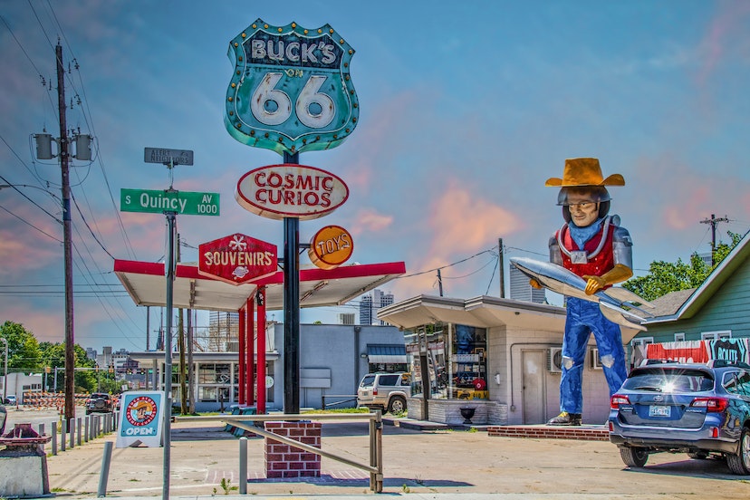 6 13 2020 Tulsa USA - Curio and Souvenir Shop along Route 66 in Tulsa Oklahoma featuring statue of space cowboy holding rocket created from retro gas station.