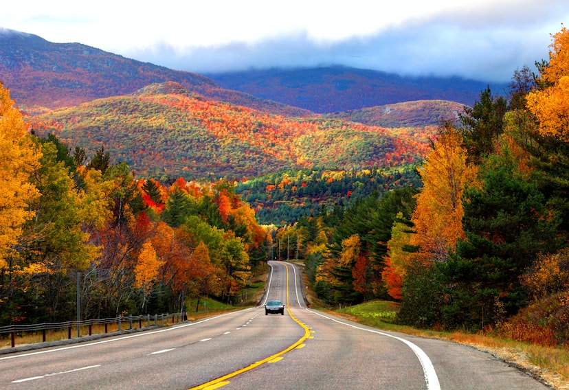 Scenic Autumn road in the Adirondacks region of New York - Scenic road in the Adirondacks region of New York during the autumn foliage season