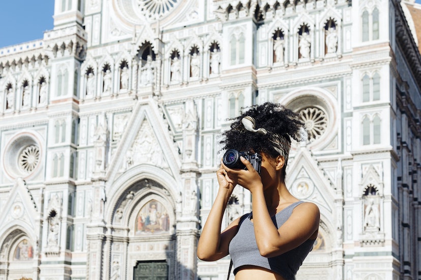 Tourist with camera in Milan